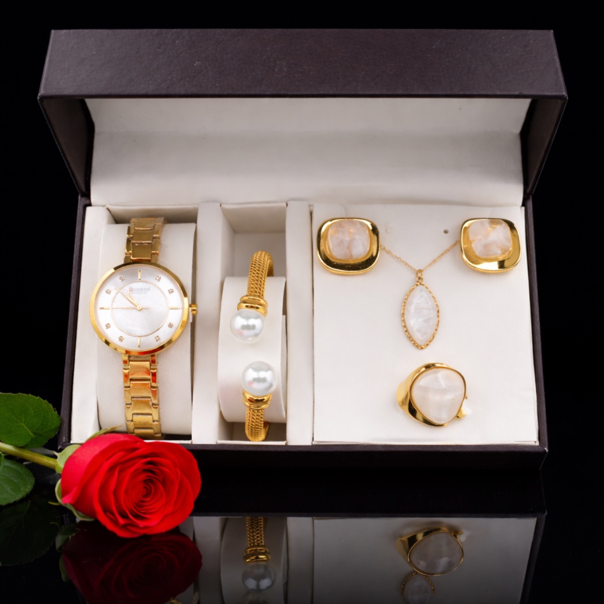 Σετ γυναικείο ( ρολόι -ριβιέρα βραχιόλι - ριβιέρα κολιέ-δαχτυλίδι ( one size ) -σκουλαρίκια )